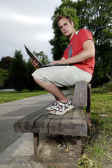 Image showing Young man with notebook