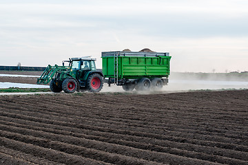 Image showing Modern tractor with trailer