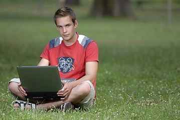 Image showing Young man with notebook
