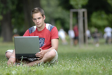 Image showing Young man with notebook