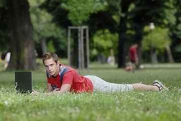 Image showing Young man with notebook