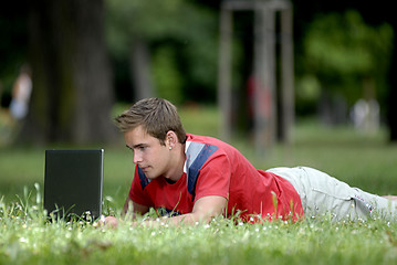 Image showing Young man with notebook