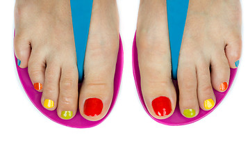 Image showing Beautiful female feet with a pedicure color