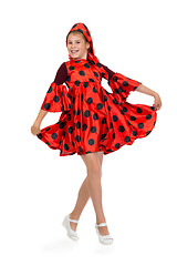 Image showing Girl dancing in a red polka-dot dress 