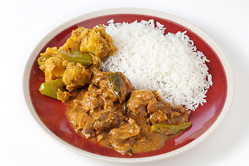 Image showing chettinadu chicken curry with veg and rice