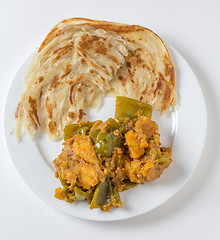 Image showing Aloo capsicum curry and paratha high angle