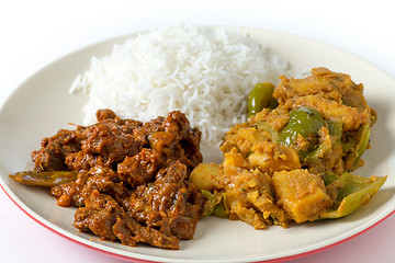 Image showing Beef curry with potato and rice