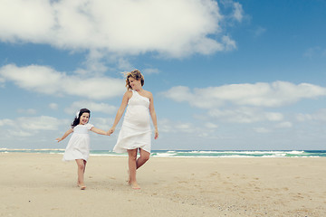 Image showing Walking on the beach