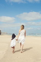 Image showing Walking on the beach