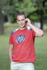 Image showing Young man talking on phone