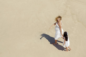 Image showing Walking on the beach