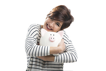 Image showing Woman with a piggybank