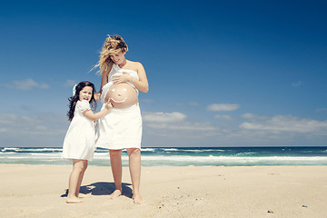 Image showing Making a smile on mom's belly