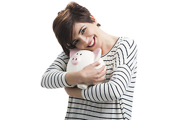 Image showing Woman with a piggybank