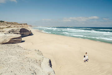 Image showing Walking on the beach