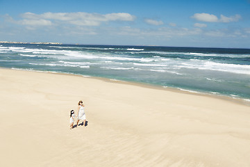 Image showing Walking on the beach