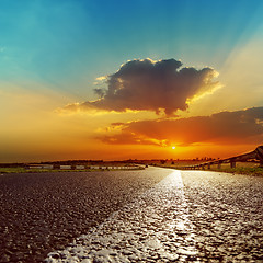 Image showing fantastic sunset over asphalt road