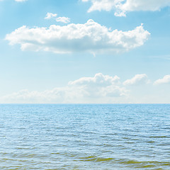 Image showing blue sea and cloudy sky over it