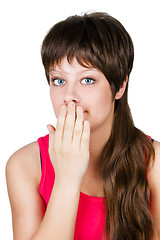 Image showing young beautiful woman covering her mouth with her hand. isolated