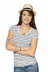 Image showing Smiling young woman in stripped tshirt and straw hat