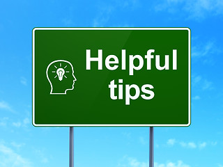 Image showing Education concept: Helpful Tips and Head With Lightbulb on road sign background