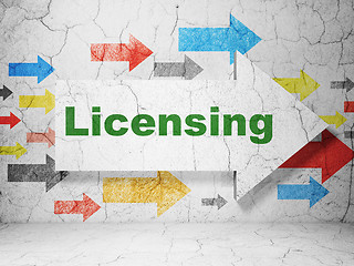 Image showing Law concept: arrow with Licensing on grunge wall background