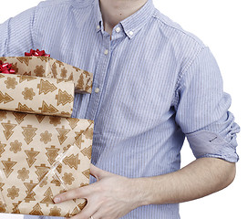 Image showing Young man holding a present