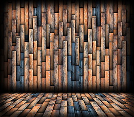 Image showing layers of wood planks on wall
