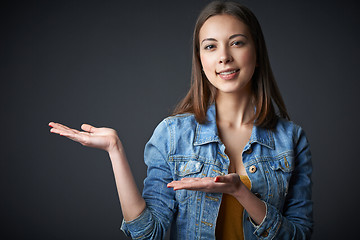 Image showing Portrait of denim teen female welcoming