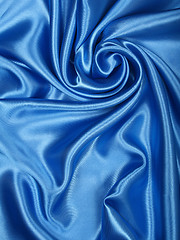 Image showing Smooth elegant blue silk as background 