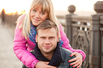 Image showing Woman is hugging her boyfriend in winter