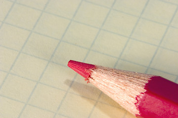 Image showing Red pencil on notepad