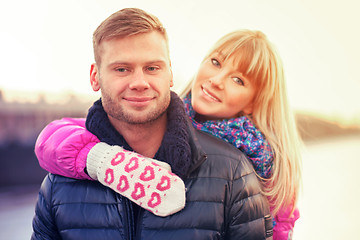 Image showing Woman in lovely mittens and her boyfriend