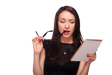 Image showing Sexy woman in glasses with notepad