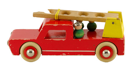 Image showing antique wooden fire-engine  toy isoalted on white  