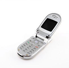 Image showing Clamshell cell phone on white background