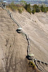 Image showing Wooden stairs on mountain slope