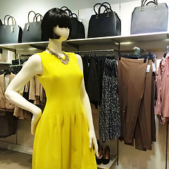 Image showing Mannequin in yellow dress