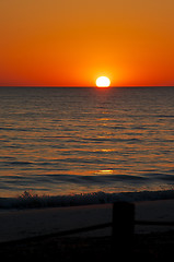 Image showing orange sunset over beach