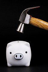 Image showing Piggy Bank With Hammer