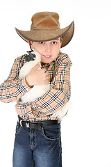 Image showing Boy cuddling a pet chicken