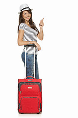 Image showing Woman tourist with suitcase