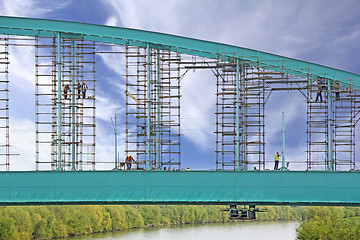 Image showing Workers on the scaffolding