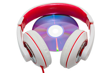 Image showing Colorful casual wired headphones and multimedia disc