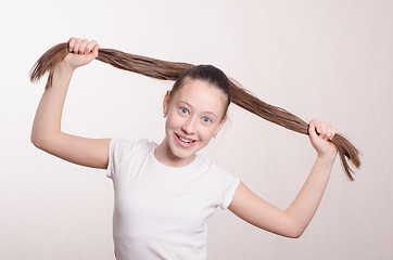 Image showing Portrait girl of twelve in a positive mood