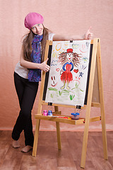 Image showing Girl stands with her painted pattern