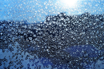 Image showing Ice pattern and sunlight on winter glass