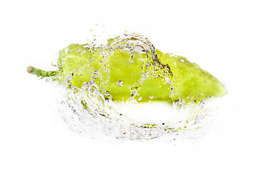 Image showing green pepper with water splash isolated