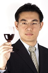 Image showing Chinese Businessman And Wine