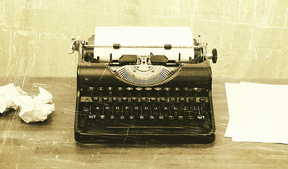 Image showing Old typewriter with paper